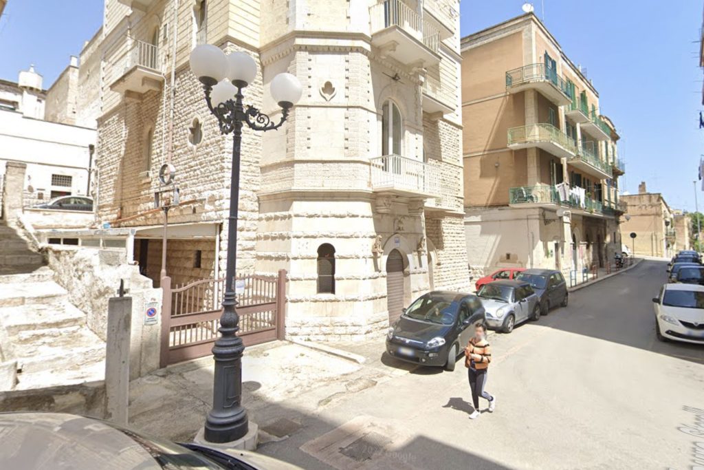 British tourists watched in horror as masked gunmen stormed an Italian restaurant and shot dead a 62-year-old waiter in what investigators believe was a case of mistaken identity.