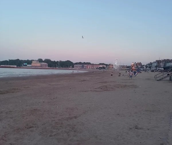 Brits branded "scum" after Weymouth Beach left covered in dirty nappies, booze cans and plastic toys during Bank Holiday heatwave as temperatures soared to 33C.