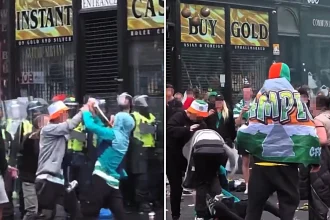 Celtic fans clash with each other during Glasgow city centre chaos after dramatic Scottish Premiership title victory over Hearts sparks 12 arrests and police injuries.