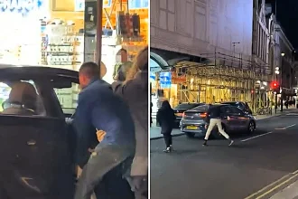 Driver brutally beaten in a shocking road rage attack at Piccadilly Circus - as his car rolls dangerously down the street towards a busy crossing.