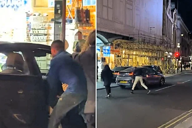 Driver brutally beaten in a shocking road rage attack at Piccadilly Circus - as his car rolls dangerously down the street towards a busy crossing.