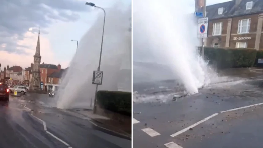 Huge water main burst near famous Fine Lady on White Horse statue in Banbury showers cars with massive explosive jet during UK heatwave.