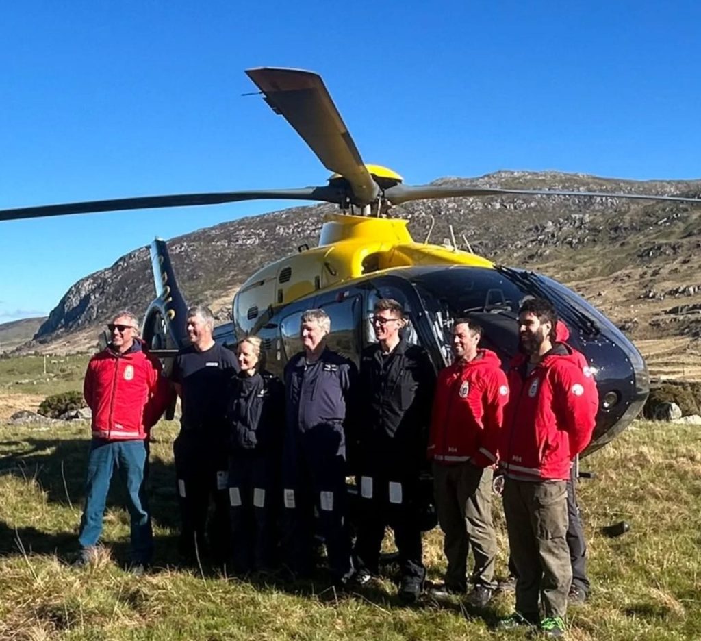 Hiker with ankle injury rescued by maritime coastguard helicopter after becoming stranded on Tryfan mountain in Wales, airlifted to safety by emergency crew.