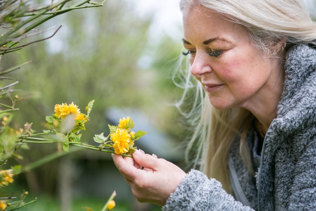 A mum who spent decades unable to see clearly finally saw her son's face properly on his 21st birthday - after life-changing eye surgery transformed her world.