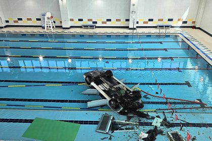 Elderly driver, 74, crashed her car through glass wall plunging 16ft into indoor swimming pool at Hanam Sports Centre, South Korea, rescued by swimmers.