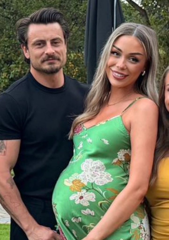British influencer goes viral after hiding her huge six-week pregnancy bump at work - but trolls insist it's just bloat and she's hitting back.