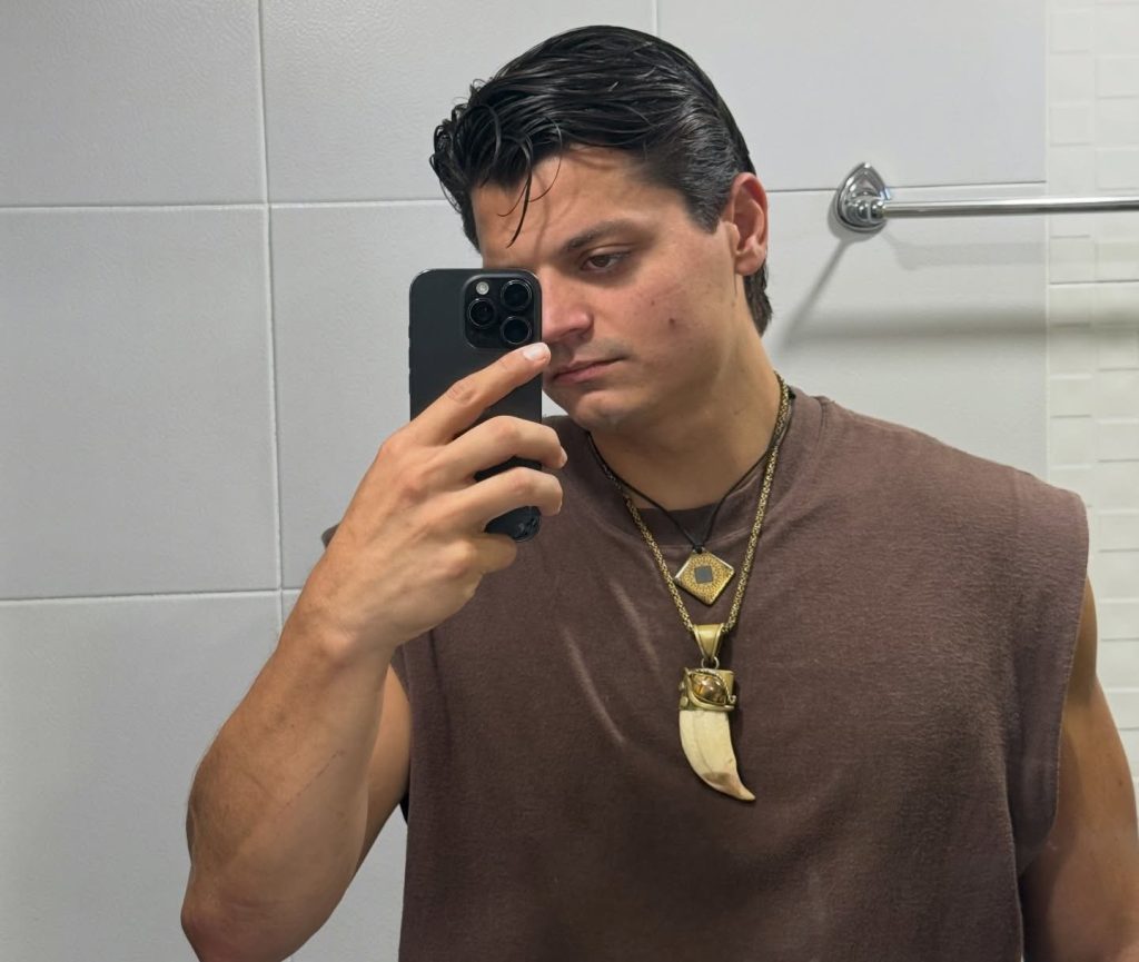 A Venezuelan influencer with nearly one million followers was bitten and struck in the face by an alligator after leaping from a boat to catch the reptile with his bare hands.