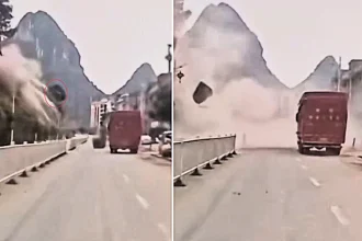 Dramatic dash-cam footage captured the terrifying moment a mountain collapsed and sent huge boulders crashing onto a truck in southern China - injuring two people.