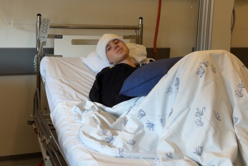 Pro cyclist Kamilla Aasebø, 19, has shared her shocking scar after a Paris-Roubaix crash left her with a brain bleed that required emergency surgery and left her fighting to walk.