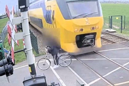 A Dutch teen cyclist missed death by inches when a speeding train narrowly avoided him at a level crossing, with rail firm ProRail releasing the footage as part of a teen safety campaign.