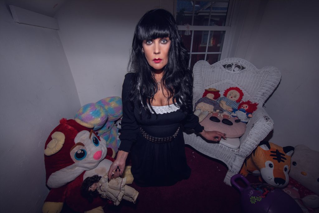 Ghost hunter Brocarde claims she was scratched by demonic child spirit 'Sallie' while spending the night in haunted Kansas house - left bedbound for days.