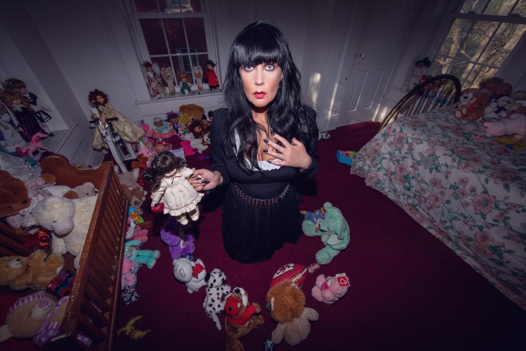 Ghost hunter Brocarde claims she was scratched by demonic child spirit 'Sallie' while spending the night in haunted Kansas house - left bedbound for days.