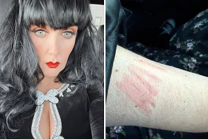 Ghost hunter Brocarde claims she was scratched by demonic child spirit 'Sallie' while spending the night in haunted Kansas house - left bedbound for days.