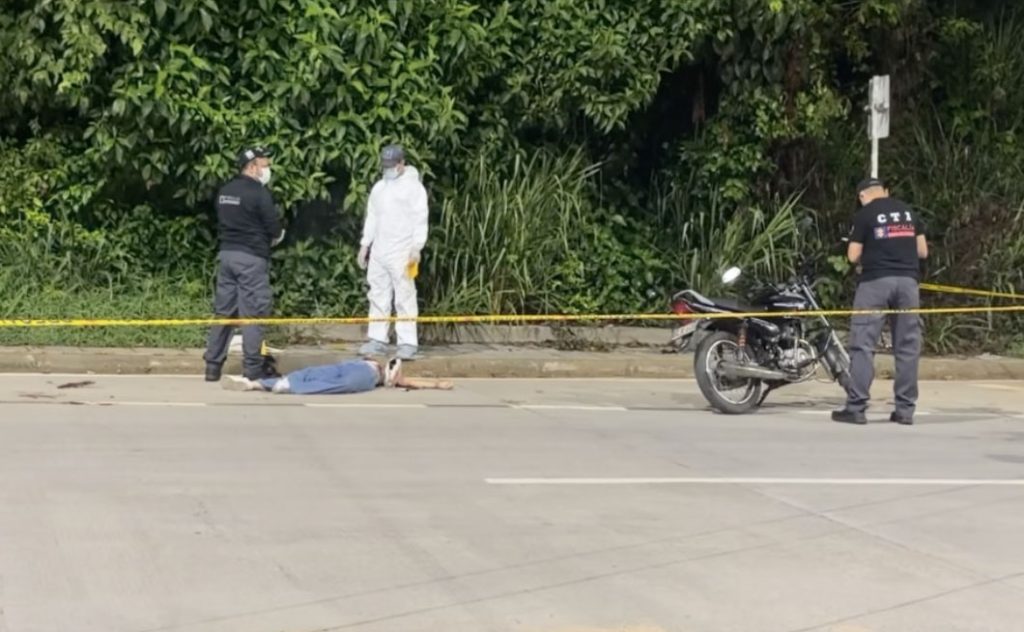 Two best friends aged 20 gunned down by masked motorcycle assassins in high-speed Colombia ambush after night out, with one believed linked to drug gang boyfriend.