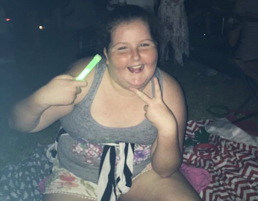 Aussie Lara, 22, shed an incredible 10 stone after years of hiding behind friends in photos - now she barely recognises her miserable former self.