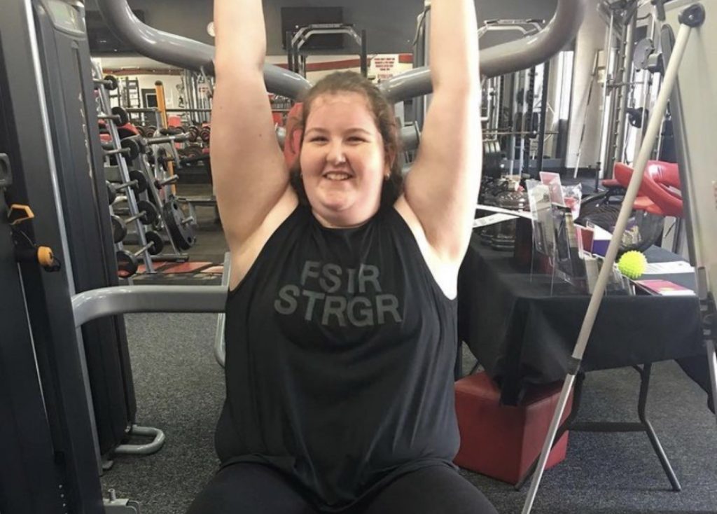 Aussie Lara, 22, shed an incredible 10 stone after years of hiding behind friends in photos - now she barely recognises her miserable former self.