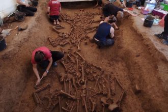 Archaeologists found 77 headless skeletons in a 7,000-year-old Slovak settlement - but researchers believe the skulls were carefully removed after death rather than in a massacre.