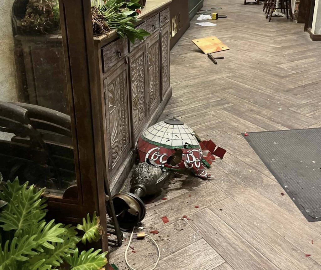 A tourist stripped off his shirt, gave diners a 10-second warning and launched into a rampage at a Vietnamese cafe - causing £14,000 damage and trapping people upstairs.