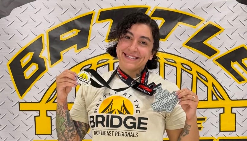 A powerlifter who qualified for a major competition just two days earlier has been killed in a suspected murder-suicide, leaving behind a seven-year-old son and a devastated gym community.