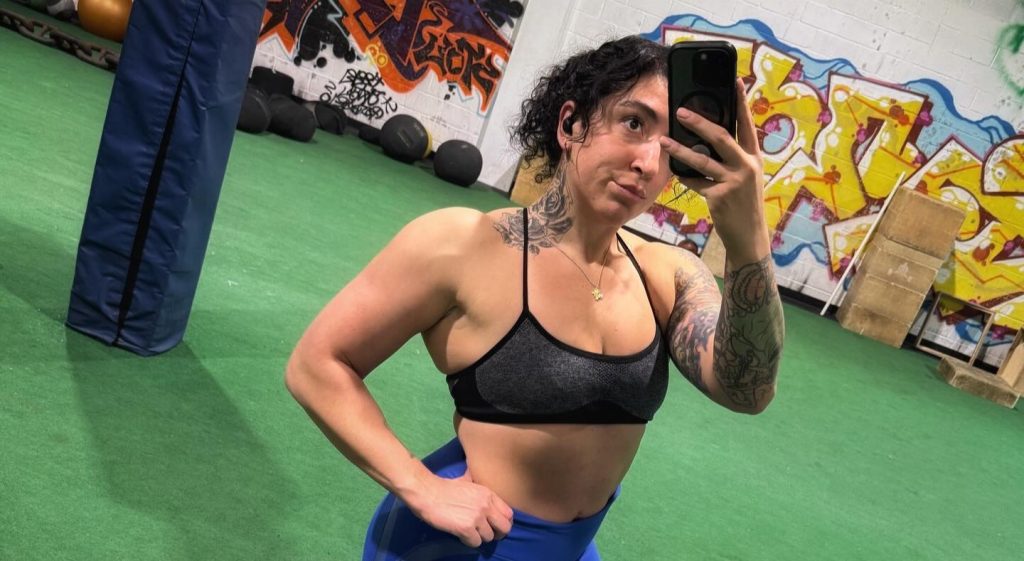 A powerlifter who qualified for a major competition just two days earlier has been killed in a suspected murder-suicide, leaving behind a seven-year-old son and a devastated gym community.