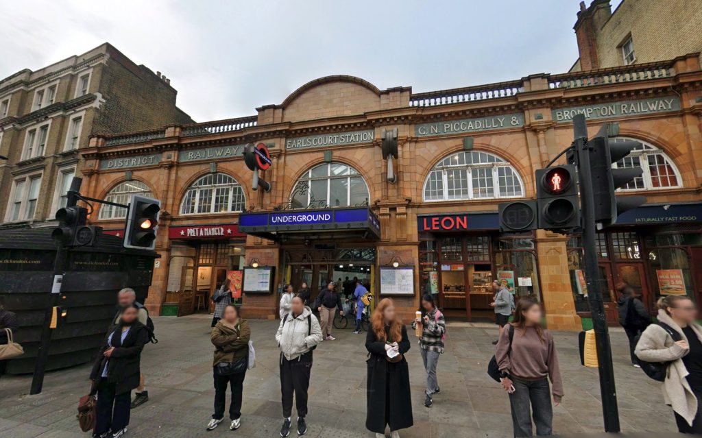 Three men traded punches and kicks on a Tube train during the evening rush hour at Earl's Court, leaving one topless and another with his shirt ripped as stunned commuters watched on.