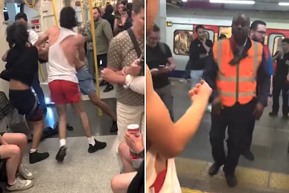 Three men traded punches and kicks on a Tube train during the evening rush hour at Earl's Court, leaving one topless and another with his shirt ripped as stunned commuters watched on.