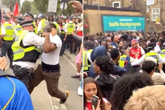 Police grapple with Arsenal fans as Premier League title parade descends into "carnage" with 16 arrests, mass rescues and a stabbing on day of wild celebrations.