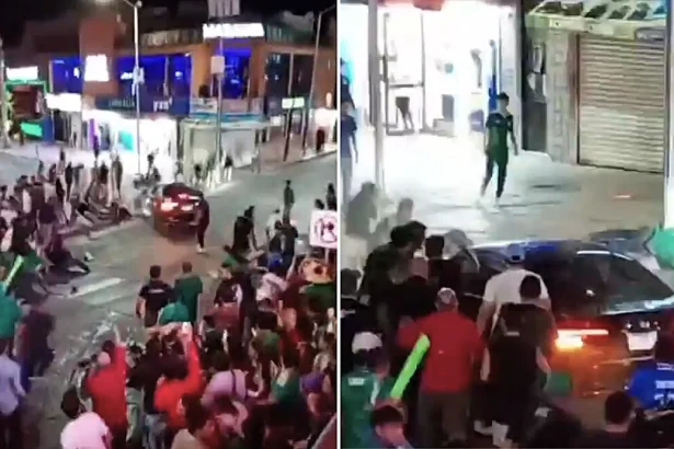 A driver ploughed through a crowd of World Cup celebrations in Mexico, injuring 17 people after suddenly accelerating as fans surrounded his car - one person was left motionless in a pool of blood.