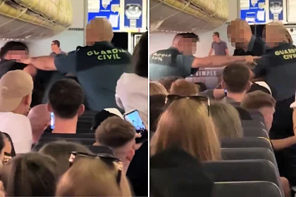 A drunk passenger punched a police officer in the face during an arrest on a Ryanair flight from Edinburgh - leaving terrified holidaymakers watching as officers wrestled him to the floor.