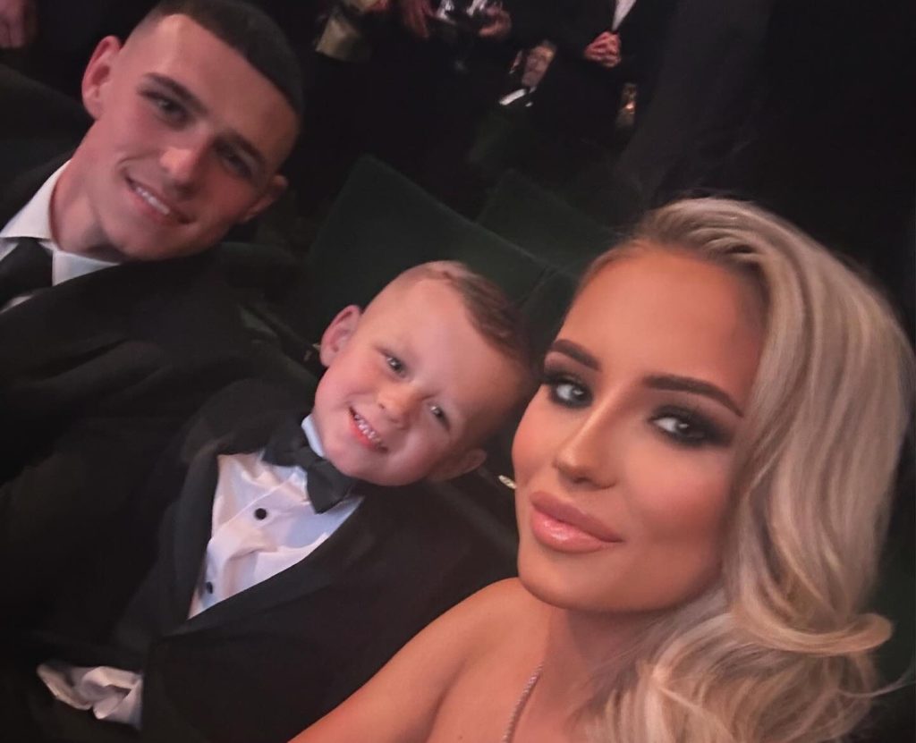 Adult star Lily Phillips tried her luck with exiled England star Phil Foden ringside at the boxing - but a fuming Rebecca Cooke wagged her finger and waved her away.