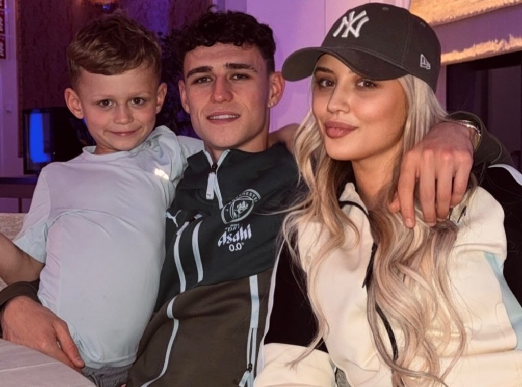 Adult star Lily Phillips tried her luck with exiled England star Phil Foden ringside at the boxing - but a fuming Rebecca Cooke wagged her finger and waved her away.