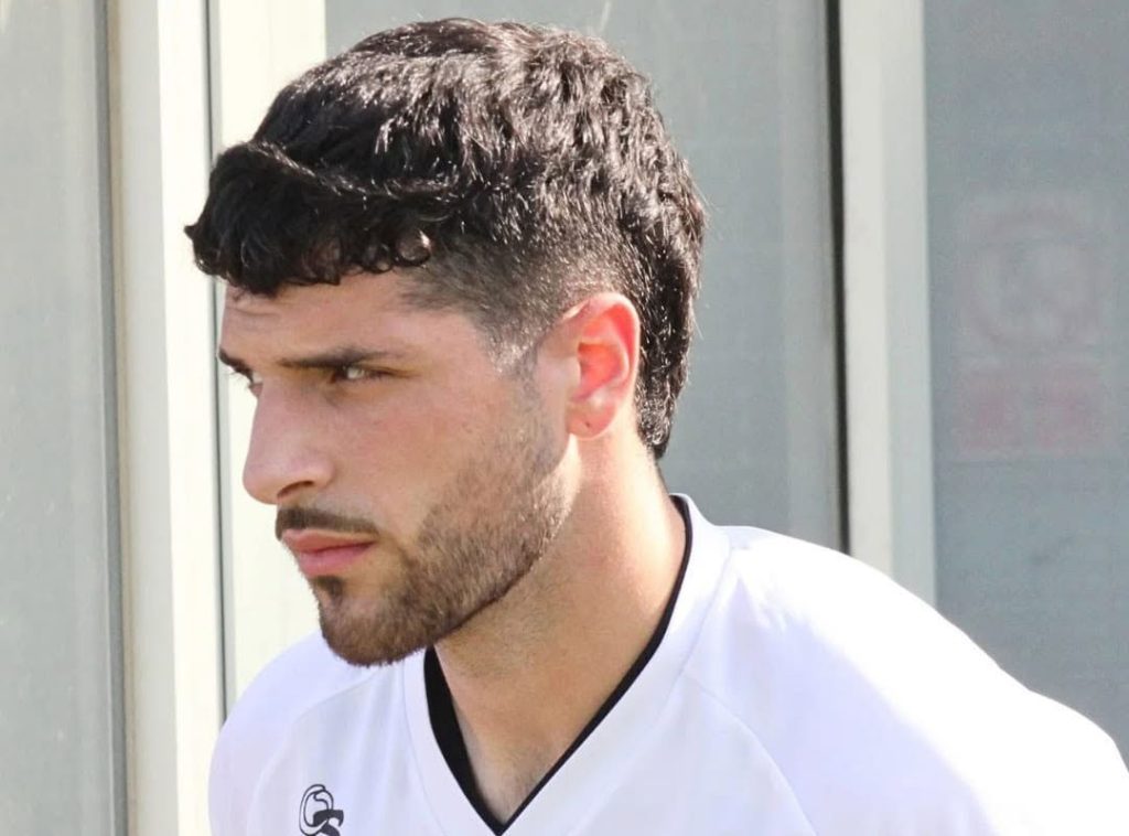 A 19-year-old footballer died in a head-on crash that burst into flames in Italy - over 1,000 mourners packed his funeral as his mother revealed he had donated his organs.