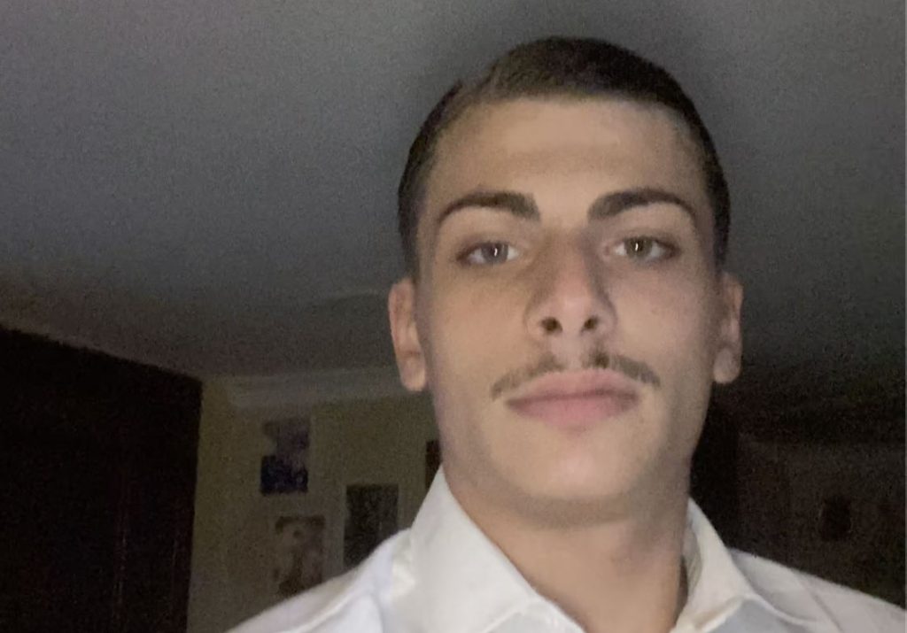 A 21-year-old footballer was shot dead outside his home in Naples after a grudge over a five-a-side foul festered for months - the suspect is a 16-year-old with clan ties.