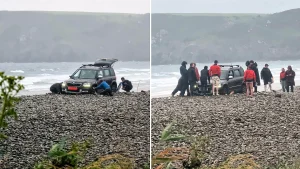 A hapless driver sparked a frantic beach rescue after getting their Skoda wedged axle-deep in a pebble bank just yards from the sea in Pembrokeshire.