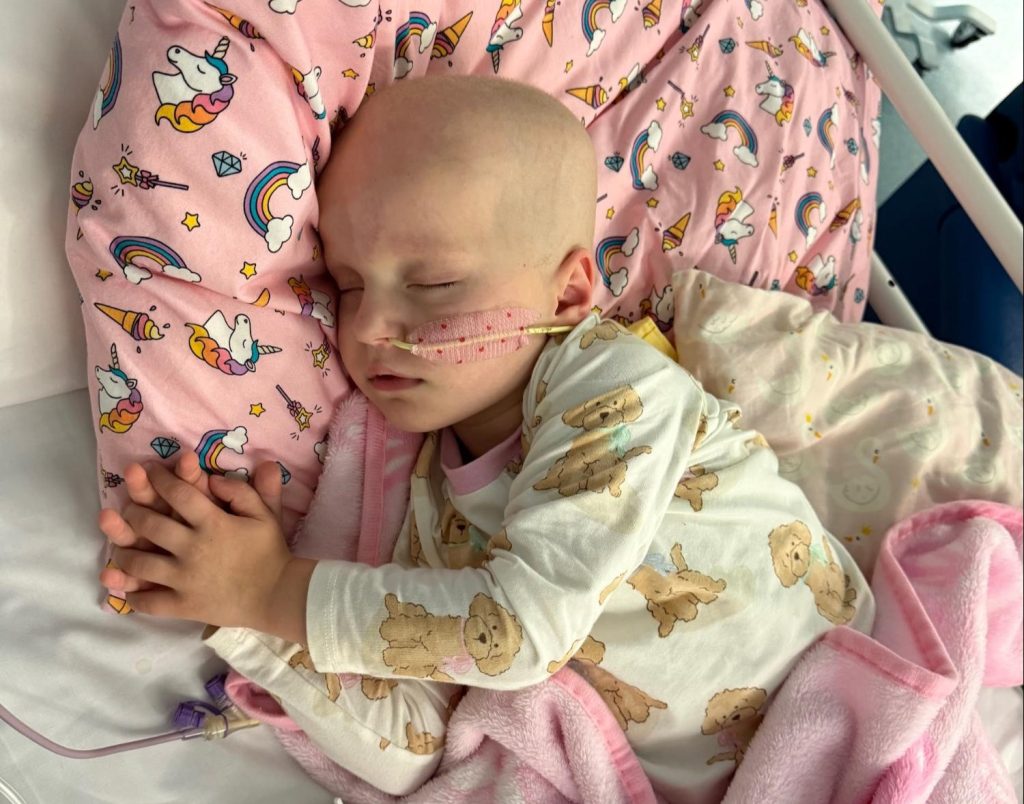 A mum who thought her toddler's bloated tummy was constipation learned it was rare kidney cancer three hours after a GP visit - surgeons had never seen anything like it.