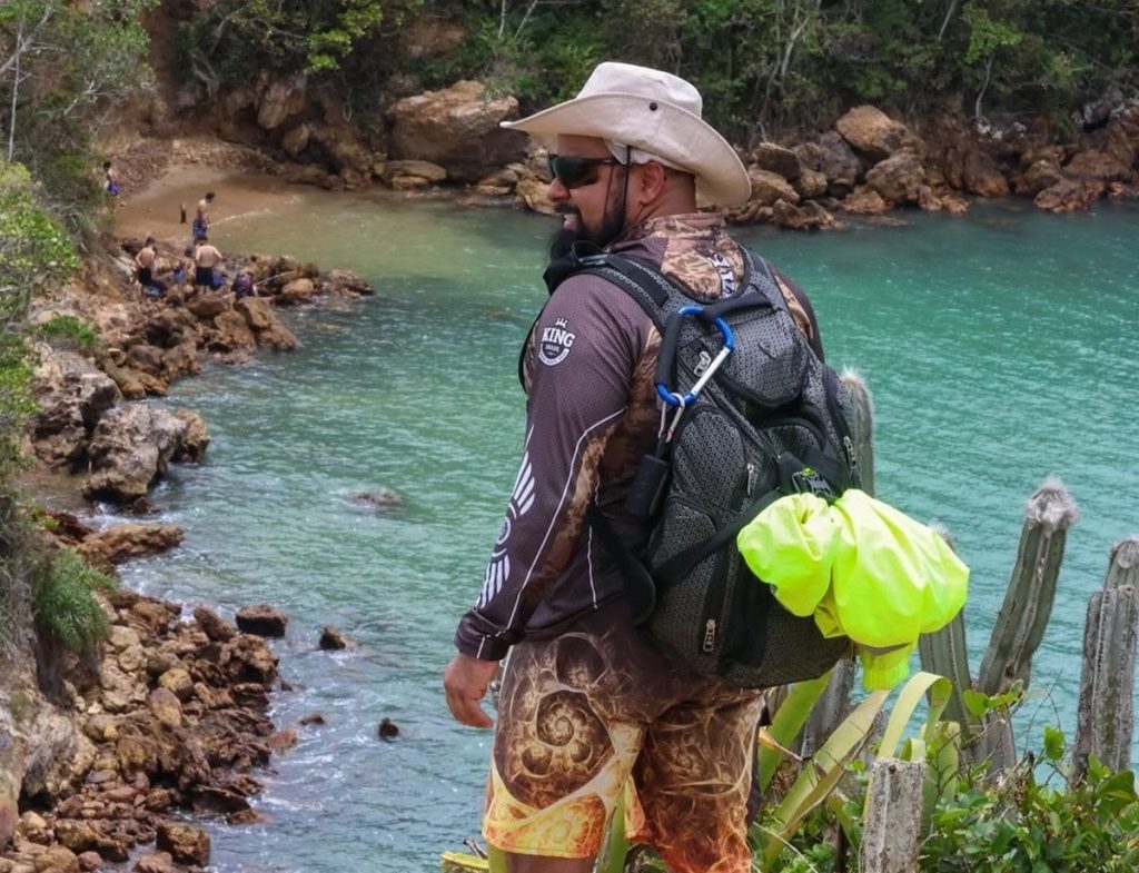 A hiker plunged 150m to his death moments after posing for a photo at the top of a towering rock viewpoint in Brazil as his horrified companion filmed and screamed.
