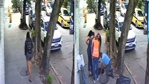 Woman left battered and bruised after plunging into open manhole hidden beneath loose cover on her way to work as shocking CCTV captures terrifying fall into drainage.