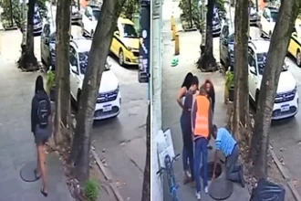 Woman left battered and bruised after plunging into open manhole hidden beneath loose cover on her way to work as shocking CCTV captures terrifying fall into drainage.