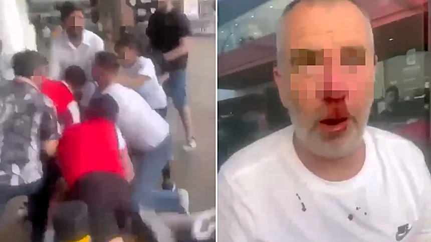 Huge brawl breaks out outside East London sports bar after Arsenal's heartbreaking Champions League defeat to PSG as punches fly and one fan left bloodied in shocking scenes.