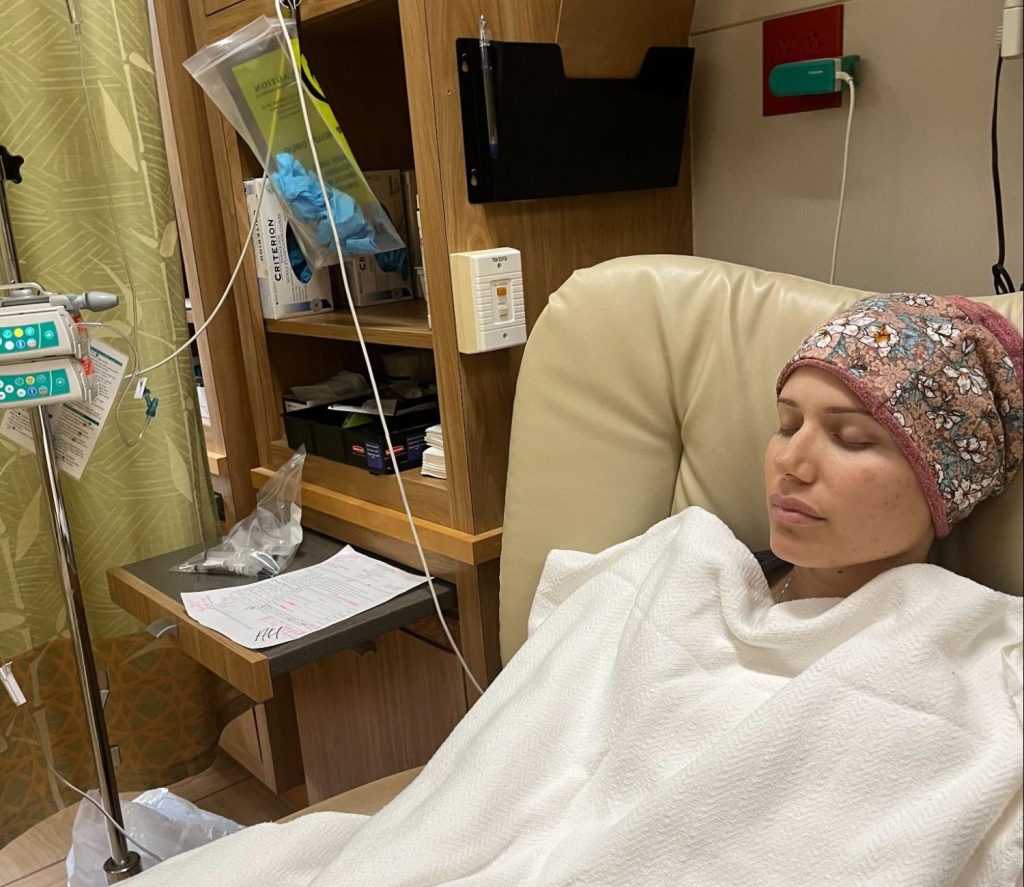 A mum diagnosed with a rare deadly breast cancer while pregnant feared she wouldn't see her kids grow up - but baby Naomi arrived healthy and she is now cancer-free.