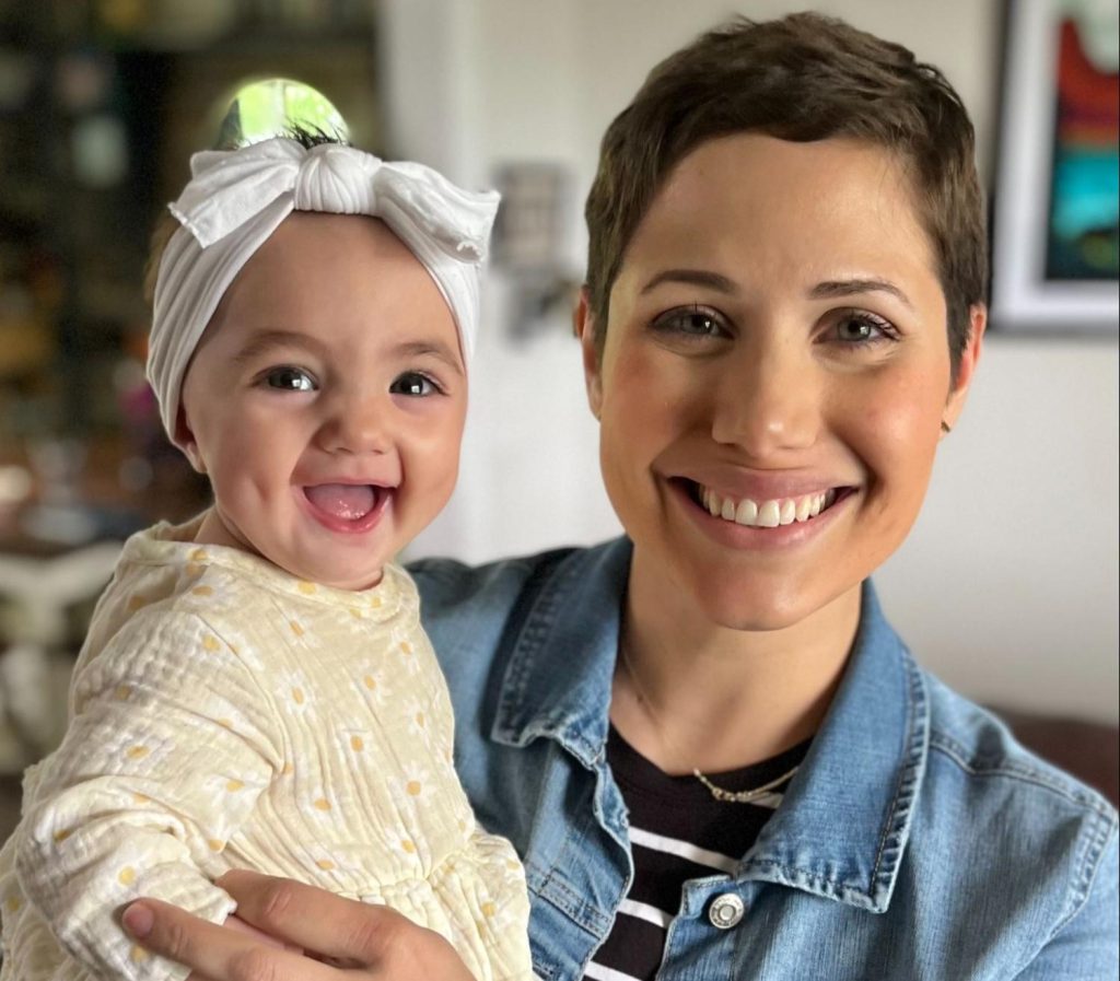 A mum diagnosed with a rare deadly breast cancer while pregnant feared she wouldn't see her kids grow up - but baby Naomi arrived healthy and she is now cancer-free.
