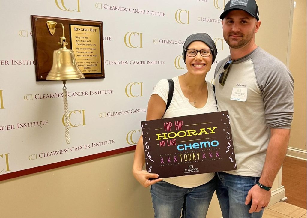 A mum diagnosed with a rare deadly breast cancer while pregnant feared she wouldn't see her kids grow up - but baby Naomi arrived healthy and she is now cancer-free.
