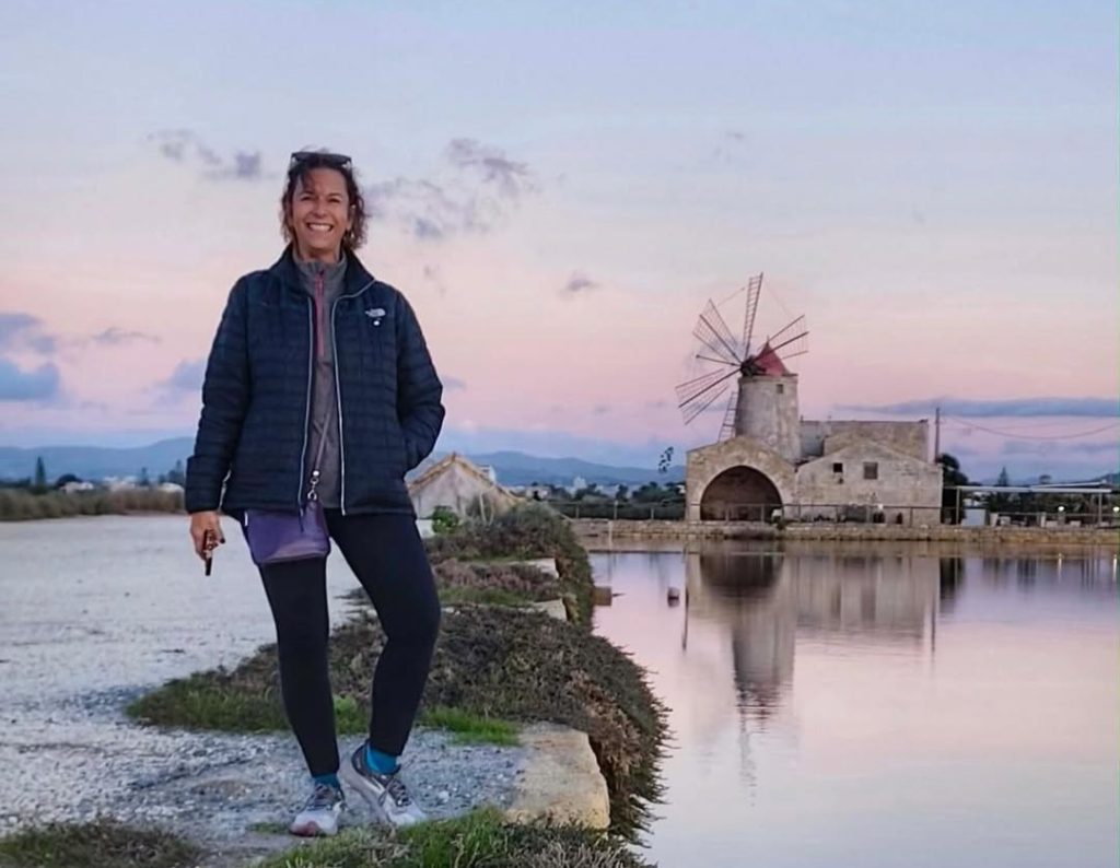 A woman who grew tired of her "boring" life divorced her husband of 30 years, quit her job and left her kids behind to start fresh in Palermo, Italy - and has zero regrets.