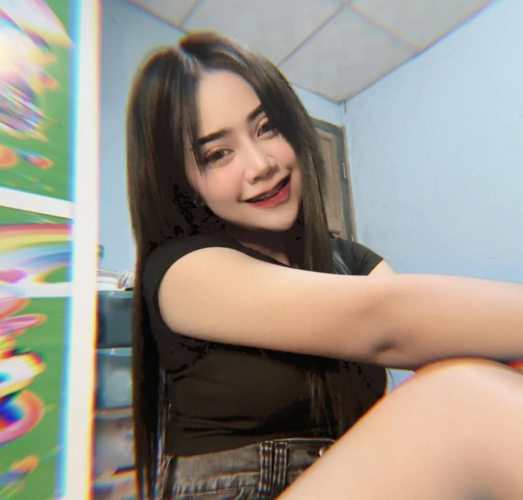 A Thai influencer with 245,000 TikTok fans was shot dead by her jealous ex while on a video call to her new boyfriend, as her young son sat in a car just metres away.