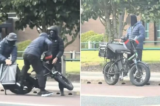 A delivery rider in Leeds was swarmed by four masked thugs on motorised bikes who tried to rip open his carrier box - but he sprawled across his bike and foiled the robbery.