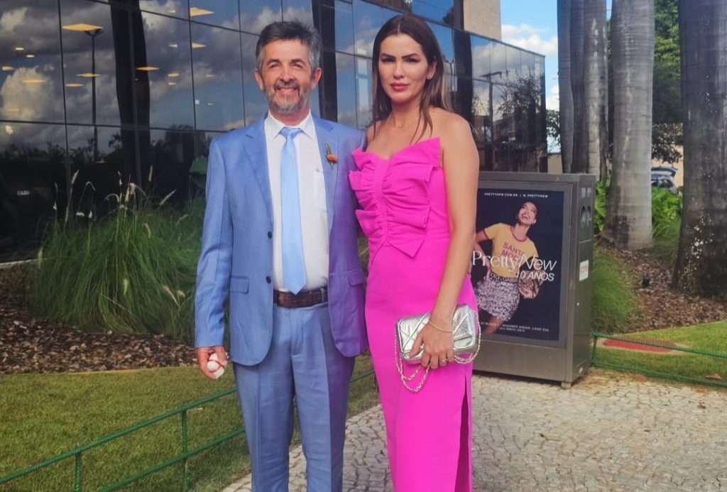 A mother-of-three was shot dead by her ex-mayor husband while signing their divorce papers after he asked the lawyer to leave the room - then turned the gun on himself.