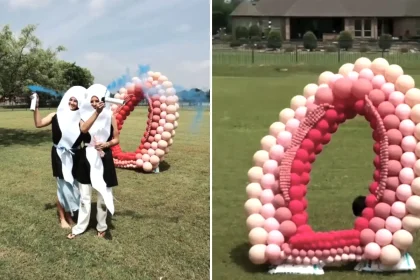 A gender reveal has gone wildly viral after guests dressed as sperm raced towards a massive balloon vagina - with one bundling through to reveal they're expecting a boy.