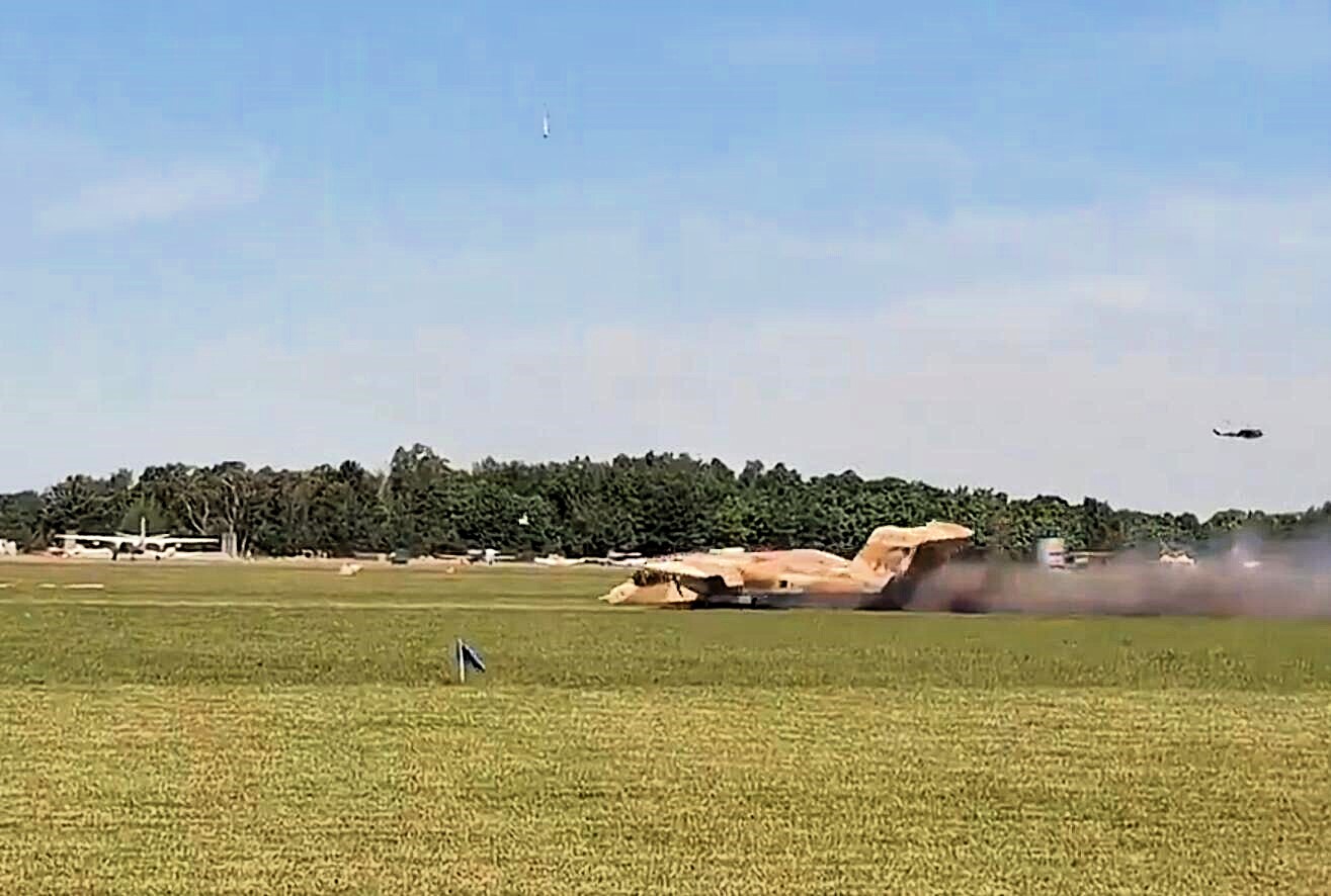 A pilot walked away unscathed after his plane snapped in half during an emergency landing at a Polish airshow - the landing gear failed to deploy during a test flight before the event.