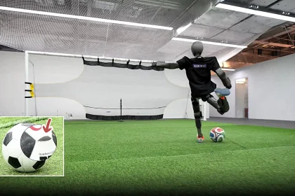 A robot footballer named the Booster T1 is smashing walls and splitting balls with its Roberto Carlos-like free kicks just ahead of the robot World Cup in South Korea.
