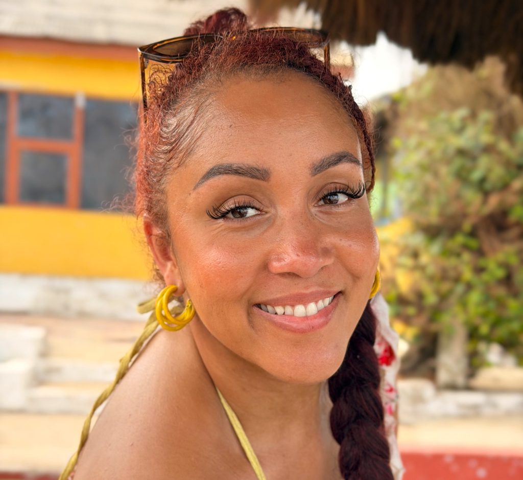 Singer and beauty queen claims she was surrounded by security guards and forced to sign "final warning" at Ghana airport after questioning KLM check-in rules.